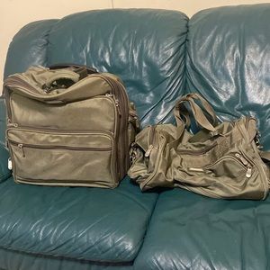 DESTINATIONS EXPANDABLE ROLLING BAG WITH MATCHING DUFFLE BAG.